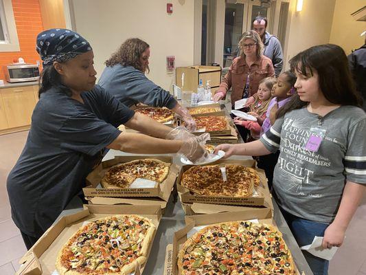 Dinner is served at each program for families.