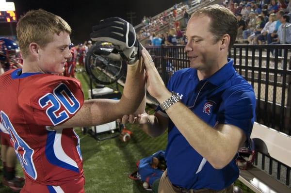 Dr Glaser at a Bixby football game.