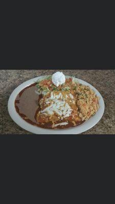 Mexican plate 3 enchiladas, beans, rice, and salad