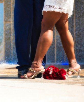 Bride and Groom. Wedding pose with red rose bouquet. Elopement. Garden Ceremony. Charlotte Wedding Officiant. NC Ordained Officiant