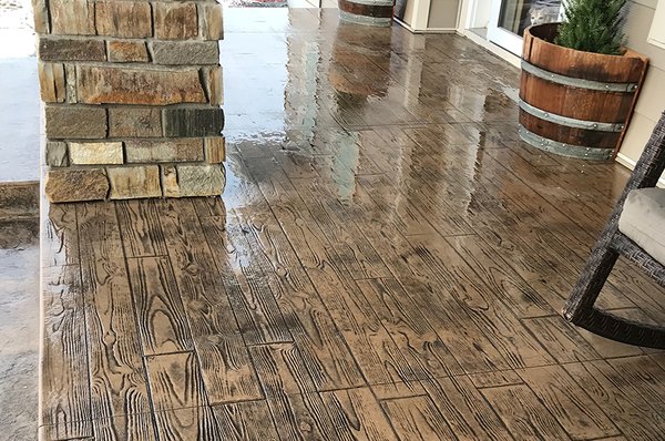 Wood stamped concrete porch.