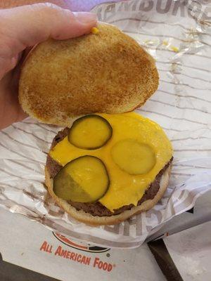 Cheeseburger with pickles