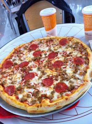 HUGE pizza at approx $22 with two toppings and two drinks