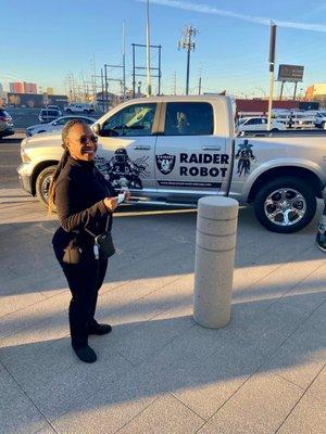 City Hall with the Raiders Robot and Ram truck