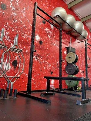 Hexbar, squat rack and bumper plates