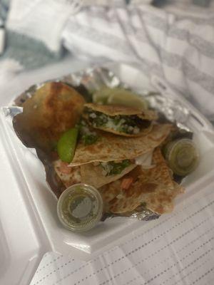 Chicken quesadillas with pico de gallo and beef gorditas with cilantro, onions and lime.