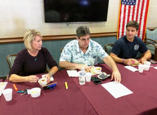 Firefighters judging the chili contest