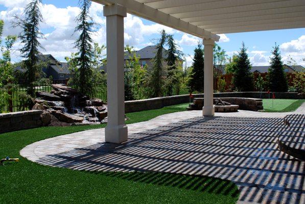 Pavers , Synthetic turf & waterfall