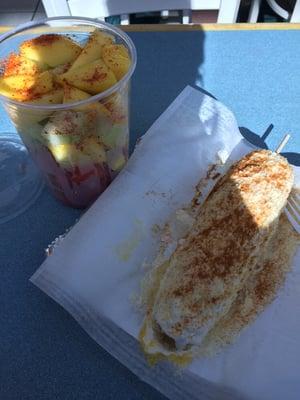 Fruit cup with chili and lime added from their condiment table and Corn (elote) with everything on it-yum!