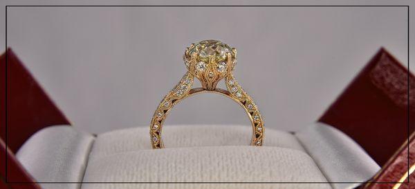 14K yellow gold ring setting with .70 carat of diamonds from Expressions with customer's own yellow diamond.