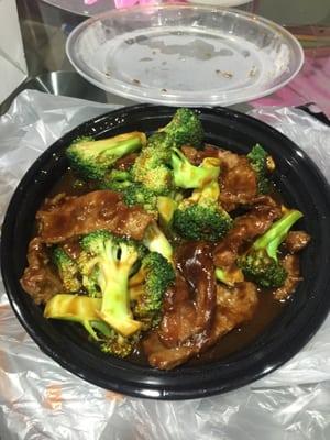 Beef and broccoli with rice on the side