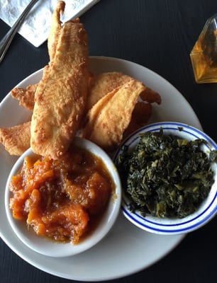 Flounder platter with candied yams and collard greens