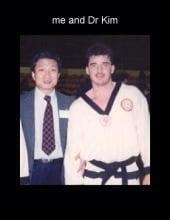 Grand Master Kim and I after a tournament .