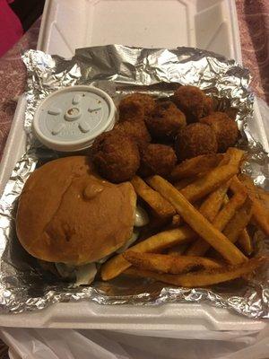 Mushroom and Swiss burger with brown gravy for dipping , fried mushrooms, and spicy fries!