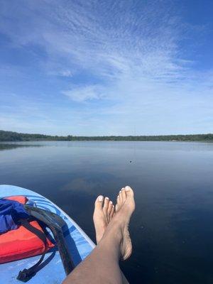 Hanging out on a Standup Paddle Board (SUP) on Lake Wingra on a calm May morning