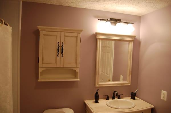 Special cabinet to match bathroom stye