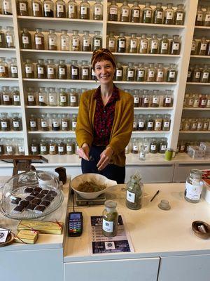 Herbalist and owner with the warmest smile of confidence