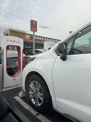 Non-tesla cars parked everywhere