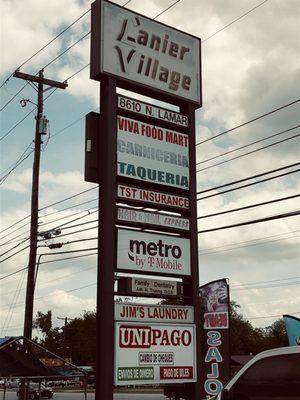 The liquor store is not even mentioned on this strip center sign.