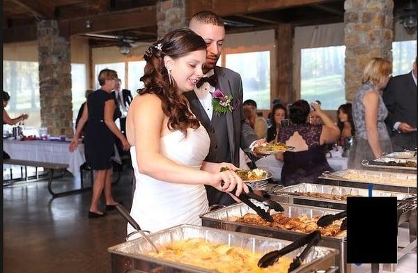 Getting ready to chow down on our Wedding Day with First Run Catering.