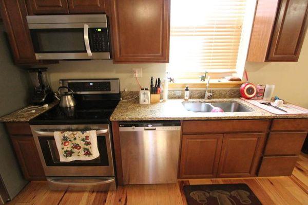 Modern kitchen layout, granite countertops