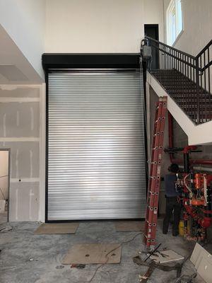 New insulated steel roll up door keep your building from outside weather conditions