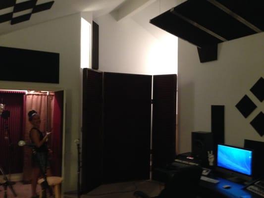 Rachel putting the final touches on a recording studio build.