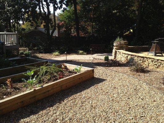 Pebble Path, Raised Garden Bed, paver walkway, plants