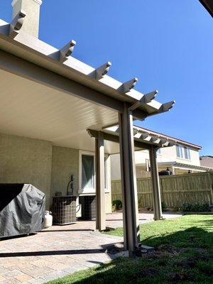 Solid patio cover with Corbel ends.