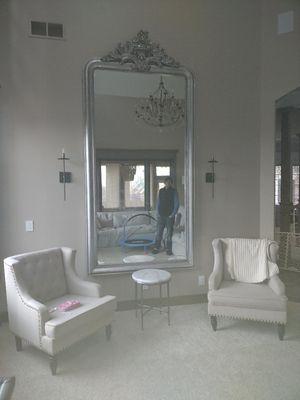 A pretty big mirror hung for a client