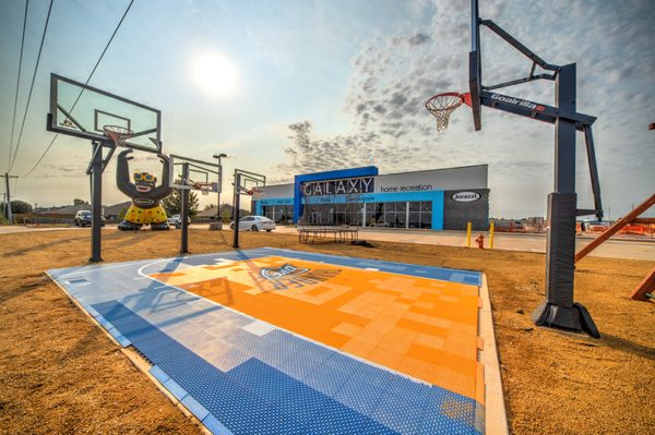 The family that plays together, stays together. Ask us about our basketball goals from Goalrilla and Flexcourt custom court flooring.