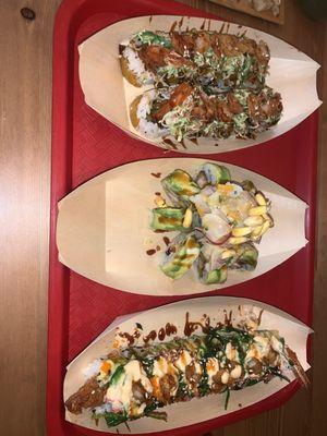 Temptation roll (top), ceviche roll (middle), monster roll (bottom)