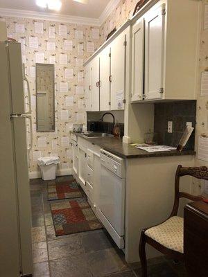 Kitchen with microwave, coffee pot