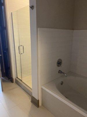 Large bathroom with tub and shower