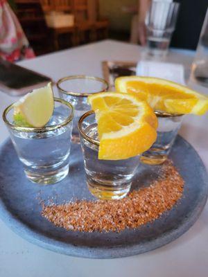 Mezcal and tequila shots with tajin