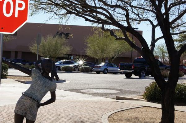 Art in the parking lot of Ace Hardware