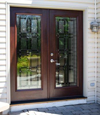 Replaced front and rear entry doors with beautiful decorative glass