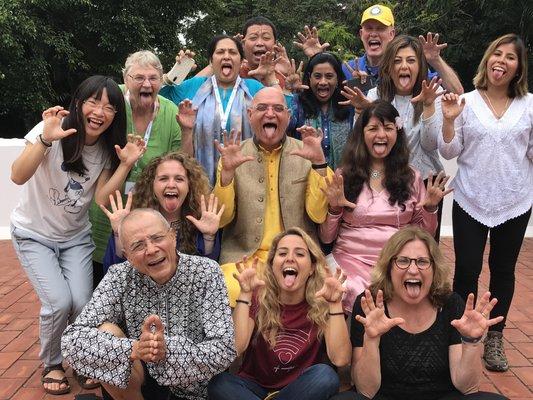 A laughter yoga group in India doing "Lion Laughter."The teacher for Laughter Yoga NYC, Lisa Berman lower rt. Founder, Dr Kataria in center