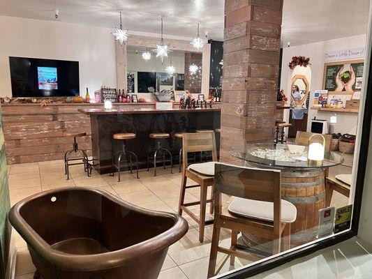 Large into facing into the tasting room with the iconic copper tub