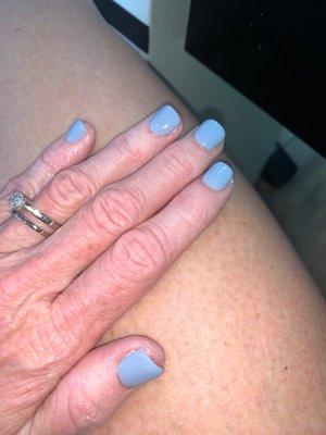 Beautiful dip manicure with a pale bluish grey.