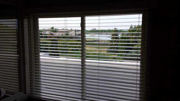 A view to the Sakonnet river thru a Graber Traditions 2" cordless wood blind