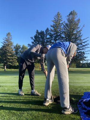 These young men were working hard to make the course look the way it does!!