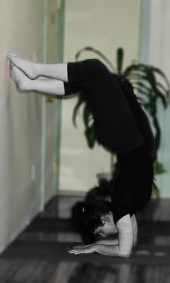 Practicing Scorpion against the wall.