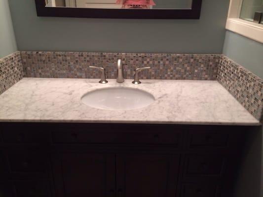 New glass mosaic tile backsplash in master bath