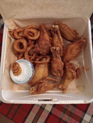 Cajun Dry Rub wings with curly fries and ranch dressing