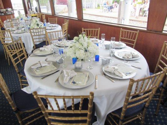 Table setting for Bridal shower on a yacht.