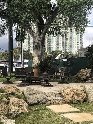 Seating area, trees, and New River