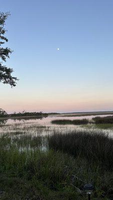 Moon over the coastal river area from Belle Bluff Island Campground