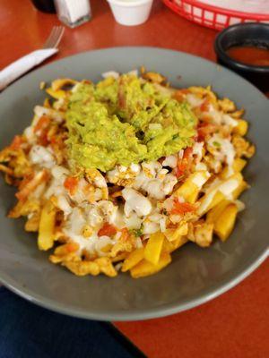 The Chicken Nacho Fries are a hidden gem here. You won't find them on the menu, but they are fantastic.