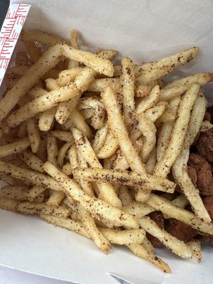 Fries all covered in oil residue.